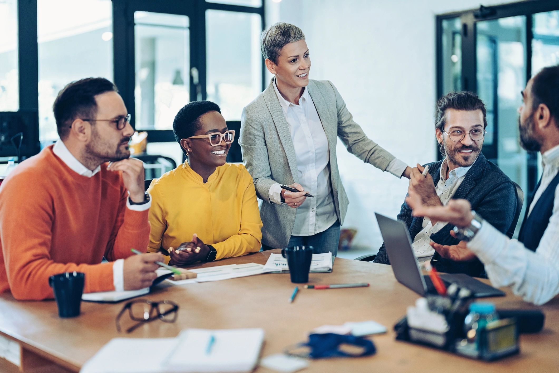 IT team collaborating around a conference table